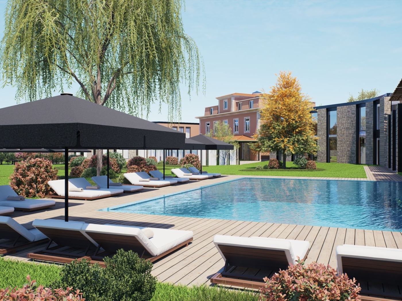 Alfaias Hotel Project — piscina exterior e zona de estar.